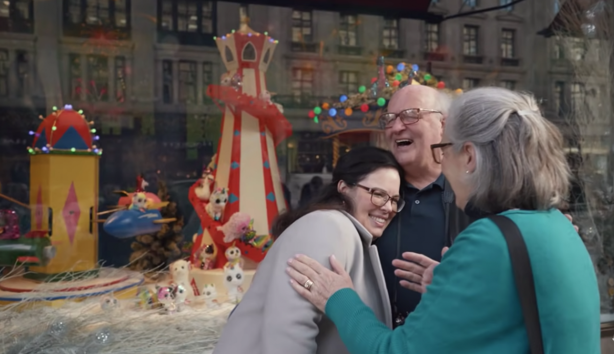 Family hugging in WestJet Christmas advertisement