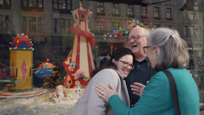 Family hugging in WestJet Christmas advertisement